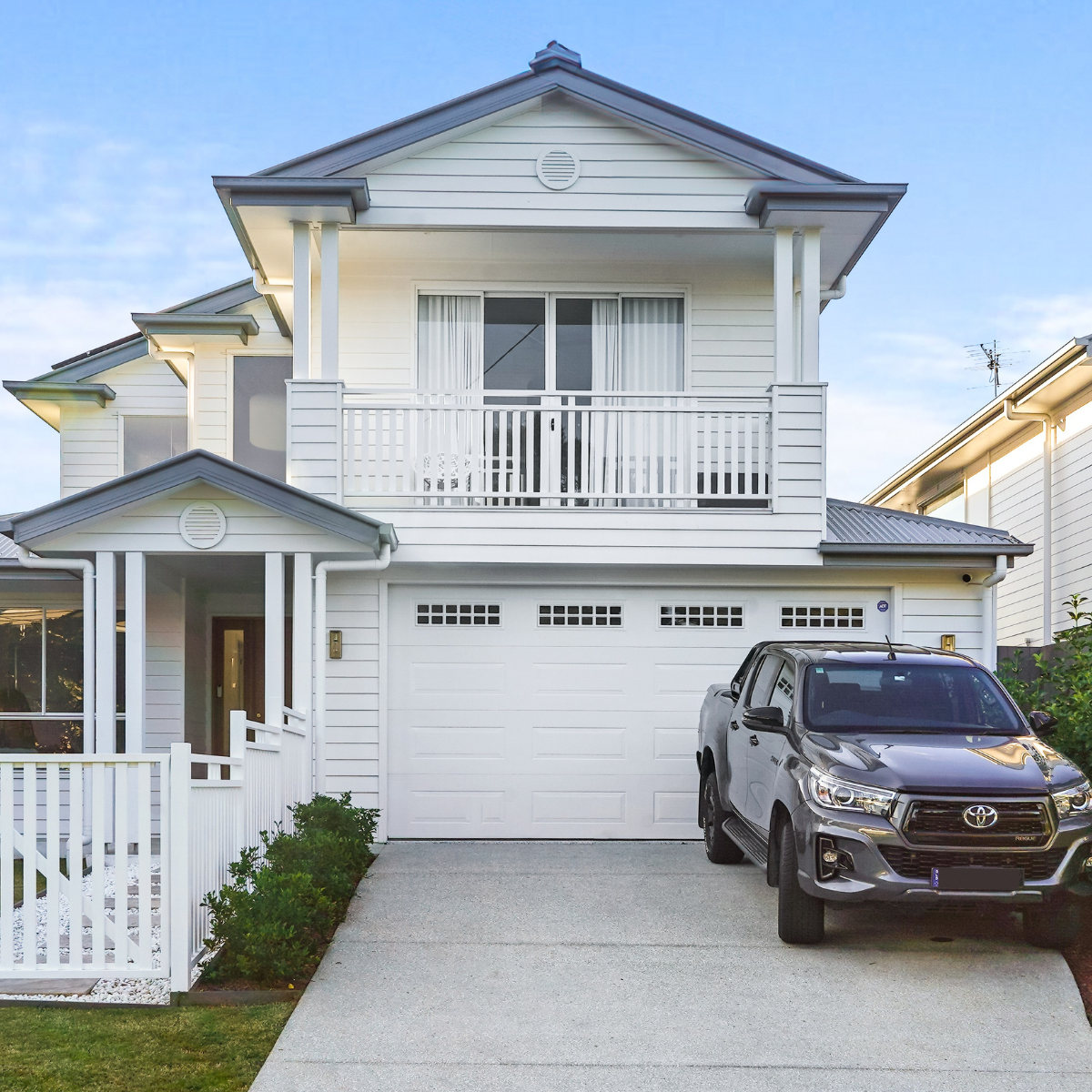 Designer garage door with Hampton style in Dover White