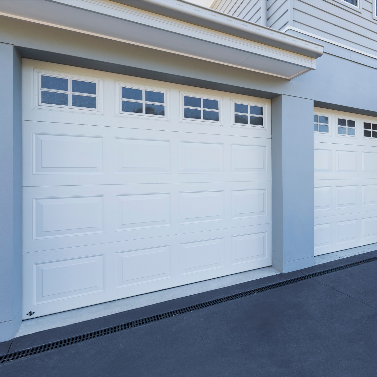 Sectional door installation symbolising operational excellence